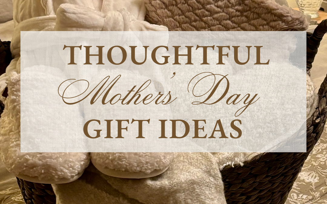 Thoughtful Mother’s Day gift basket with cozy slippers, a soft robe, and self-care gifts on a bed.